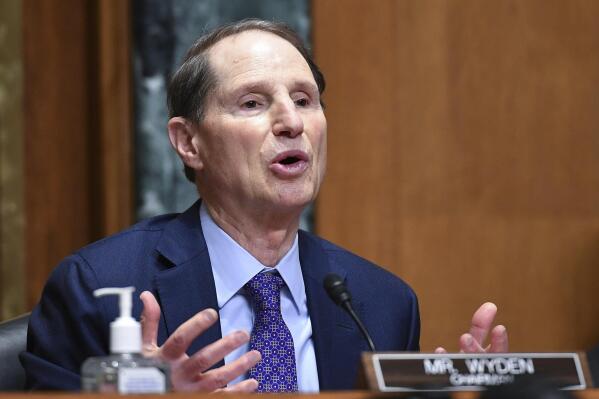 FILE - Sen. Ron Wyden, D-Ore., speaks during a Senate Finance Committee hearing on Oct. 19, 2021, on Capitol Hill in Washington. Child welfare officials in Oregon will stop using an algorithm to help decide which families are investigated by social workers, opting instead for an entirely new process that officials said will make more racially equitable decisions. Wyden said he had long been concerned about the algorithms used by his state’s child welfare system and reached out to the department again following an AP story to ask questions about racial bias – a prevailing concern with the growing use of artificial intelligence tools in child protective services. (Mandel Ngan/Pool Photo via AP, File)