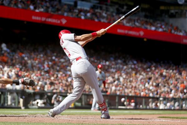 St. Louis Cardinals' Matt Carpenter hits a two-run triple against the San Francisco Giants during the seventh inning of a baseball game in San Francisco, Monday, July 5, 2021. (AP Photo/Jed Jacobsohn)