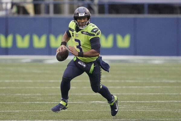 Russell Wilson Runs Football Drill with Son Future and Friend