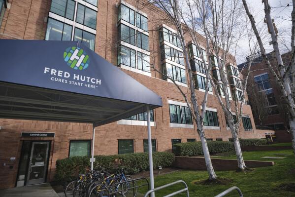 FILE - A building at the Fred Hutchinson Cancer Research Center, which merged with Seattle Cancer Care Alliance (SCCA), Seattle Children's and UW Medicine in early 2022 to create a unified adult cancer research center, is pictured on March 11, 2020, in Seattle. On Wednesday, Oct. 12, 2022, The Seattle-based Fred Hutchinson Cancer Center announced a $710 million gift from the Bezos family, the largest gift the center has ever received and one of the largest to go to any single cancer research organization in recent years. (AP Photo/Stephen Brashear, File)