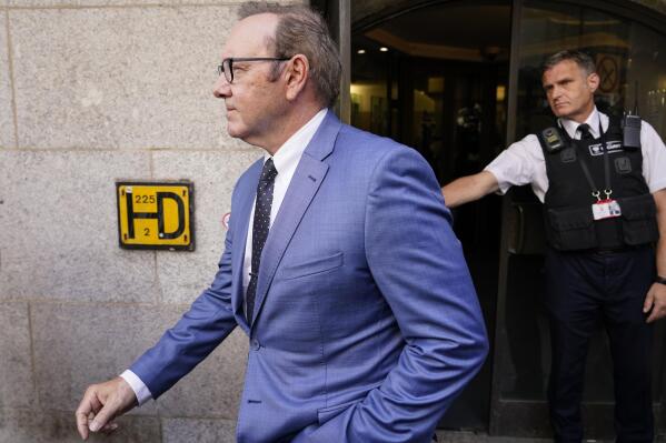 Actor Kevin Spacey leaves the Old Bailey, in London, Thursday, July 14, 2022. Spacey appeared Thursday in a court in London after he was charged with sexual offenses against three men. The 62-year-old Spacey is accused of four counts of sexual assault and one count of causing a person to engage in penetrative sexual activity without consent. (AP Photo/Alberto Pezzali)