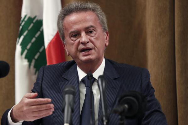 FILE - Riad Salameh, the governor of Lebanon's Central Bank, speaks during a press conference, in Beirut, Lebanon, Nov. 11, 2019. A Lebanese judge on Thursday, Feb. 23, 2023 charged the cash-strapped country's central bank governor, his brother, and an associate with corruption, two judicial officials said. Lebanon since 2019 has been in the throes of the worst economic and financial crisis in its modern history, rooted in decades of corruption and mismanagement. (AP Photo/Hussein Malla, File)