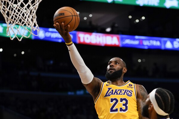 LeBron James' big night carries Lakers past Clippers in overtime
