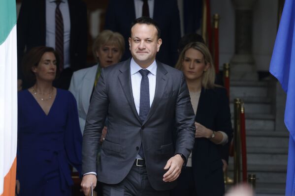 Irish Prime Minister Leo Varadkar, front, arrives for a statement in Dublin, Ireland, Wednesday, March 20, 2024. Irish Prime Minister Leo Varadkar says he will step down as leader of the country as soon as a successor is chosen. Varadkar announced Wednesday he is quitting immediately as head of the center-right Fine Gael party, part of Ireland’s coalition government. (Nick Bradshaw/PA via AP)