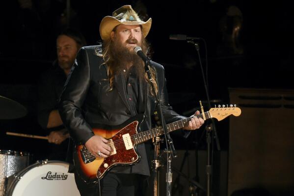 FILE - Chris Stapleton performs at the 50th annual CMA Awards in Nashville, Tenn., on Nov. 2, 2016. Stapleton will hit next month’s Super Bowl stage to sing the national anthem, while R&B legend Babyface will perform “America the Beautiful.” (Photo by Charles Sykes/Invision/AP, File)