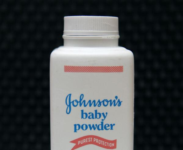 FILE - A bottle of Johnson's baby powder is displayed on April 15, 2011, in San Francisco. Johnson & Johnson is earmarking nearly $9 billion to cover allegations that its baby power containing talc caused cancer, more than quadrupling the amount that the company had previously set aside to pay for its potential liability. Under a proposal announced Tuesday, April 4, 2023, a J&J subsidiary will re-file for Chapter 11 bankruptcy protection and seek court approval for a plan that would result in one of the largest product-liability settlements in U.S. history. (AP Photo/Jeff Chiu, File)