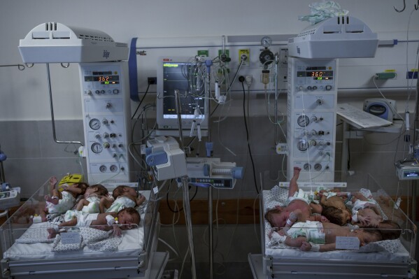 Premature babies are prepared for transport to Egypt after they were evacuated from Shifa Hospital in Gaza City to a hospital in Rafah, Gaza Strip, Monday, Nov. 20, 2023. (AP Photo/Fatima Shbair)