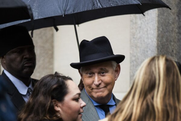 Roger Stone, a longtime Republican provocateur and former confidant of President Donald Trump, waits in line at the federal court in Washington, Tuesday, Nov. 12, 2019. (AP Photo/Manuel Balce Ceneta)