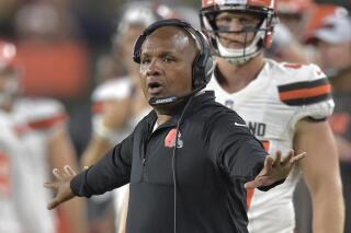 FILE - Cleveland Browns head coach Hue Jackson watches during the second half of an NFL preseason football game against the Philadelphia Eagles, Aug. 23, 2018, in Cleveland. The Cleveland Browns have called suggestions by former coach Hue Jackson, who went 1-31 in a two-year span, that he was paid to lose games as “completely fabricated.” Jackson, who is now coaching at Grambling, made several posts on Twitter inferring that he received bonus payments from Browns owner Jimmy Haslam during his two-plus seasons with the team.(AP Photo/David Richard, File)