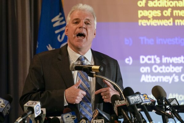 CORRECTS LAST NAME TO BLAKE FROM BLACK-Kenosha County District Attorney Michael Graveley speaks at a news conference Tuesday, Jan. 5, 2021, in Kenosha, Wis. Graveley announced that no charges will be filed against the white police officer that shot Jacob Blake, a Black man in August. (AP Photo/Morry Gash)