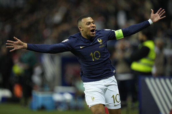 France's Kylian Mbappe celebrates after a goal during the Euro 2024 group B qualifying soccer match between France and Gibraltar in Nice, France, Saturday, Nov. 18, 2023. (AP Photo/Daniel Cole)