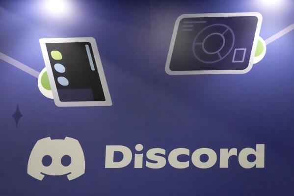 FILE - A display Discord stands at the company's booth at the Game Developers Conference 2023 in San Francisco on March 22, 2023. A major leak of classified U.S. documents that’s shaken Washington and exposed new details of its intelligence gathering may have started in a chatroom on the social media platform popular with gamers. (AP Photo/Jeff Chiu, File)