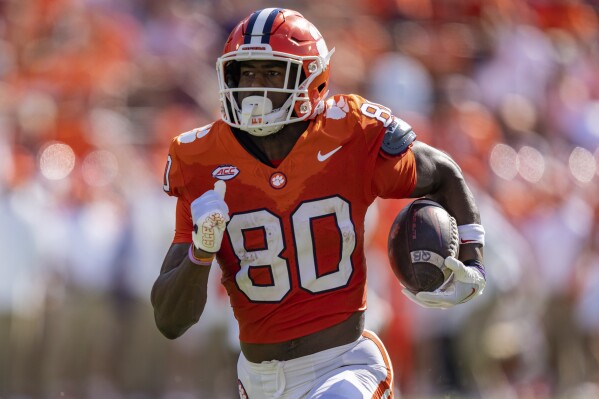Clemson wide receiver Beaux Collins (80) runs with the ball for a touchdown during the second half of an NCAA college football game against Charleston Southern on Saturday, Sep. 9, 2023, in Clemson, S.C. (AP Photo/Jacob Kupferman)