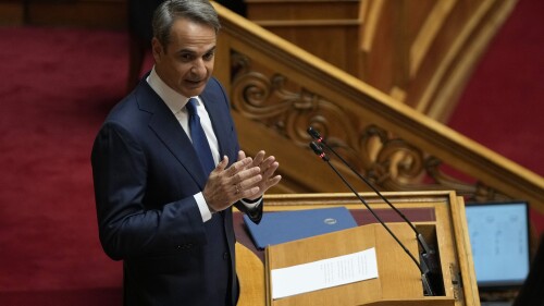 Greece's Prime Minister Kyriakos Mitsotakis speaks for the key policies and targets of his government's second four-year term, at the Greek Parliament in Athens, Greece, Thursday, July 6, 2023. The three-day debate will culminate in a vote on Saturday, during which the new government will seek a vote of confidence from the parliament. (AP Photo/Thanassis Stavrakis)