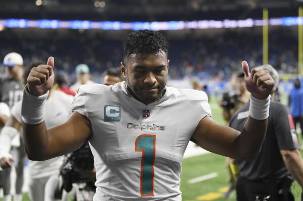 Miami Dolphins quarterback Tua Tagovailoa walks off the field after an NFL football game against the Detroit Lions, Sunday, Oct. 30, 2022, in Detroit. The Dolphins won 31-27. (AP Photo/Lon Horwedel)