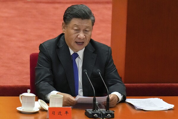 FILE - Chinese President Xi Jinping delivers a speech at an event commemorating the 110th anniversary of Xinhai Revolution at the Great Hall of the People in Beijing on Oct. 9, 2021. A new Pentagon report on China's military power says Beijing is on track to significantly increase its nuclear weapons arsenal by 2030 and is "almost certainly" learning from Russia's war in Ukraine. (AP Photo/Andy Wong, File)
