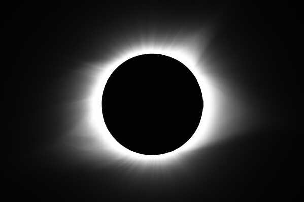 FILE - The moon covers the sun during a total solar eclipse Monday, Aug. 21, 2017, in Cerulean, Ky. According to the Indiana Election Division, many county offices will be closed on the deadline for registration for the state's primary election in anticipation of the celestial event on April 8, 2024, that will shadow much of the state. (AP Photo/Timothy D. Easley, File)