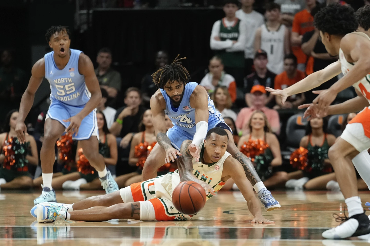 R.J. Davis does it at both ends as No. 3 UNC holds on to win at Miami