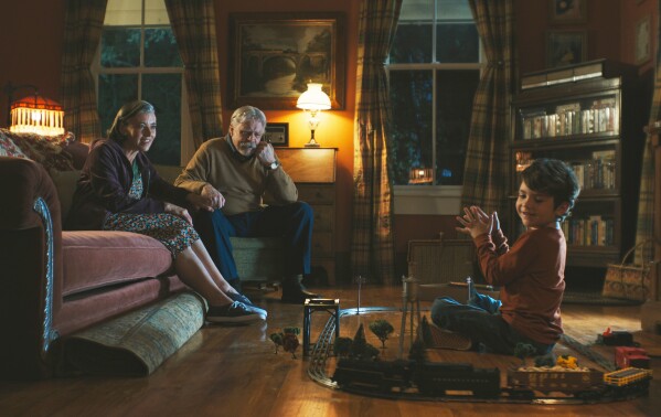 This image released by Neon shows Mia Sara, from left, Mark Hamill, and Cody Flanagan in a scene from 
