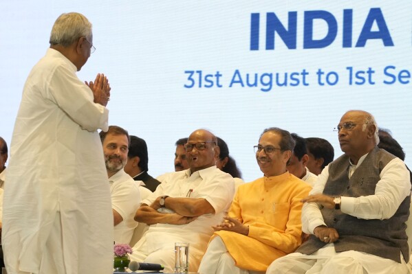 Janata Dal (United) leader Nitish Kumar greets, from left to right, Congress party leader Rahul Gandhi, Nationalist Congress Party leader Sharad Pawar, Shiv Sena (Uddhav Balasaheb Thackeray) leader Uddhav Thackeray, Congress party President Mallikarjuna Kharge, as he arrives for a press briefing after an INDIA alliance meeting in Mumbai, India, Friday, Sept. 1, 2023. India’s fractured opposition parties on Friday decided to jointly contest the 2024 national elections in their bid to unseat Prime Minister Narendra Modi and prevent his Hindu nationalist Bharatiya Janata Party from achieving a third straight win. (AP Photo/Rajanish Kakade)