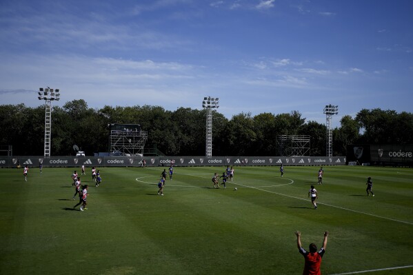 River Plate and Boca Juniors compete in a women's professional soccer match in Ezeiza on the outskirts of Buenos Aires, Argentina, Sunday, March 10, 2024. A growing group of foreigners are joining the Argentinian league as it seeks to boost its recently turned professional women's soccer teams. (AP Photo/Natacha Pisarenko)