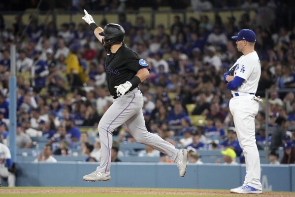 Urías 1st 11-game winner, leads Dodgers over Marlins 6-1