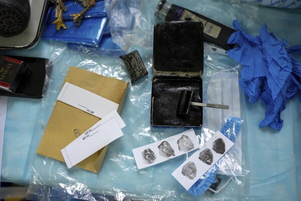 Fingerprints taken from the body of a Ukrainian prisoner of war returned by Russia, at a morgue in Kyiv, Ukraine, June 24, 2024. (AP Photo/Alex Babenko)