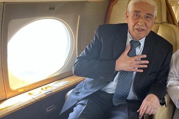 Baquer Namazi, an 85-year-old Iranian-American held by Iran over internationally criticized spying charges leaves the country Wednesday, Oct. 5, 2022, for Oman, officials said, after increasing pressure to free him amid his struggles with poor health. His 50-year-old son, however, remains in Iran. (The Namazi family via AP)