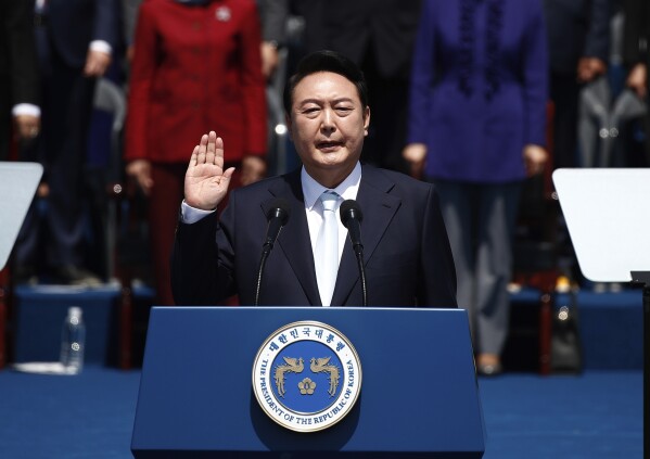 FILE - South Korean President Yoon Suk Yeol takes an oath during his inauguration in front of the National Assembly in Seoul, South Korea, on May 10, 2022. South Korean voters have handed liberals extended opposition control of parliament in what looks like a massive political setback to conservative President Yoon Suk Yeol. Some experts say the results of Wednesday’s parliamentary elections make Yoon “a lame duck” — or even “a dead duck” — for his remaining three years in office. Others disagree, saying Yoon still has many policy levers and could aggressively push his foreign policy agenda. (Jeon Heon-kyun/Pool Photo via AP, File)