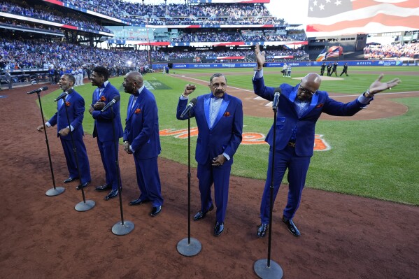 The Temptations perform before Game 5 of a baseball NL Championship Series between the Los Angeles Dodgers and the New York Mets, Friday, Oct. 18, 2024, in New York. (AP Photo/Frank Franklin II)