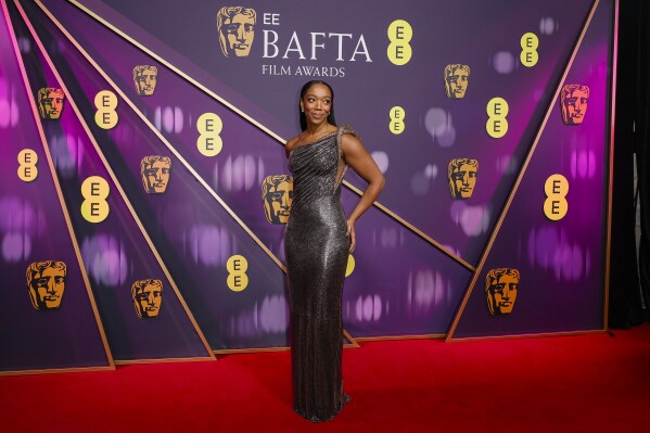 Naomi Ackie poses for photographers upon arrival at the 78th British Academy Film Awards, BAFTA's, in London, Sunday, Feb. 16, 2025. (Photo by Joel C Ryan/Invision/AP)