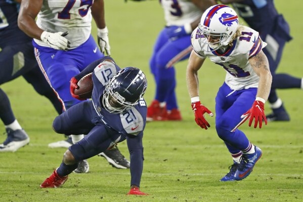 Derrick Henry tosses Josh Norman down during Bills-Titans game