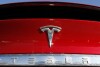 FILE - In this Feb. 2, 2020, file photo, the Tesla logo is seen in Littleton, Colo. Tesla is recalling nearly all the vehicles it has sold in the U.S. because some of the warning lights on the dashboard are too small.  Documents published by US safety regulators on Friday, February 2, 2024 indicate that the recall will occur through an online software update.  (AP Photo/David Zalubowski, File)