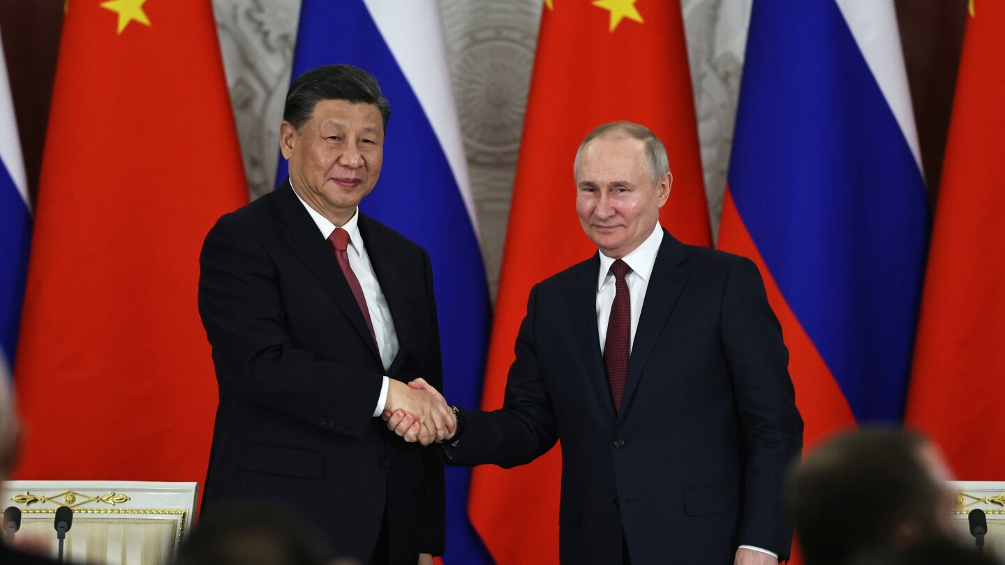 De Russische president Poetin arriveert in China als blijk van eenheid onder de bondgenoten