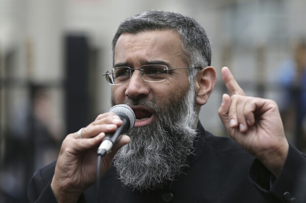 FILE - This is a Friday, April 3, 2015 file photo of Anjem Choudary, a British Muslim social and political activist and spokesman for Islamist group, Islam4UK, speaks following prayers at the Central London Mosque in Regent's Park, London. Choudary appeared in a London court on Monday, July 24, 2023 charged with leading a terrorist organization. (AP Photo/Tim Ireland, File)