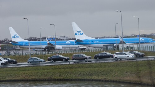 FILE - KLM airplanes sit in Schiphol Airport near Amsterdam, Netherlands, on Jan. 18, 2018. Appeals judges in Amsterdam on Friday, July 7, 2023, ruled that the Dutch government can order Schiphol Airport, one of Europe's busiest aviation hubs, to reduce the number of flights from 500,000 per year to 460,000. The ruling at Amsterdam Court of Appeal overturned a lower court's decision in April that the government did not follow the correct procedure when it called on Schiphol last year to reduce flight numbers. (AP Photo/Peter Dejong)