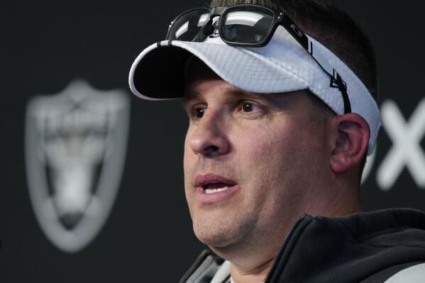 FILE - Las Vegas Raiders head coach Josh McDaniels speaks during a news conference at the NFL football team's practice facility Thursday, May 26, 2022, in Henderson, Nev. The Raiders hope that a new staff and upgraded roster will let them build off last season's playoff berth. (AP Photo/John Locher, File)