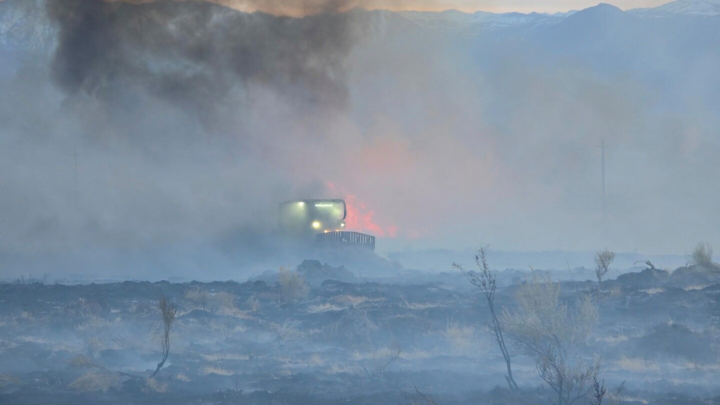 Evacuations ordered as winds pose challenges for firefighters battling California blaze