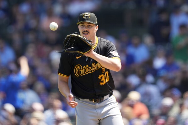 Pittsburgh Pirates starting pitcher Paul Skenes gets the ball back between batters the first inning of a baseball game against the Chicago Cubs Friday, May 17, 2024, in Chicago. (AP Photo/Charles Rex Arbogast)