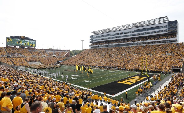 The Coolest Scenes From Iowa Women's Basketball Game at School's Football  Stadium