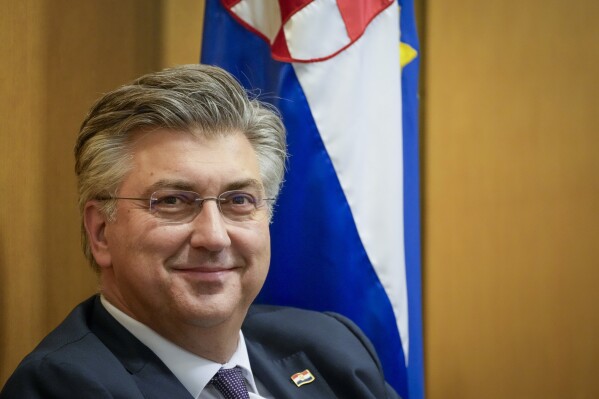 Croatian Prime minister designate Andrej Plenkovic attends a Parliament session in Zagreb, Croatia, Friday, May 17, 2024. Croatian lawmakers on Friday voted into office a new government that marks a tilt to the right in another European Union nation ahead of the 27-nation bloc's parliamentary election next month. (AP Photo/Darko Bandic)