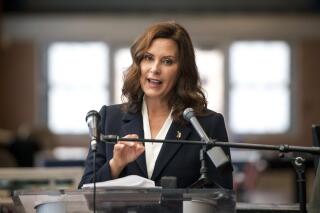 FILE - Michigan Gov. Gretchen Whitmer speaks during a news conference in Detroit on Aug. 16, 2021. Gov. Whitmer on Thursday, Nov 18, 2021, proposed $300 million in water spending to help local utilities sample for lead, plan for pipe replacement and connect users of contaminated wells to the municipal supply.  (Nic Antaya/Detroit News via AP, File)