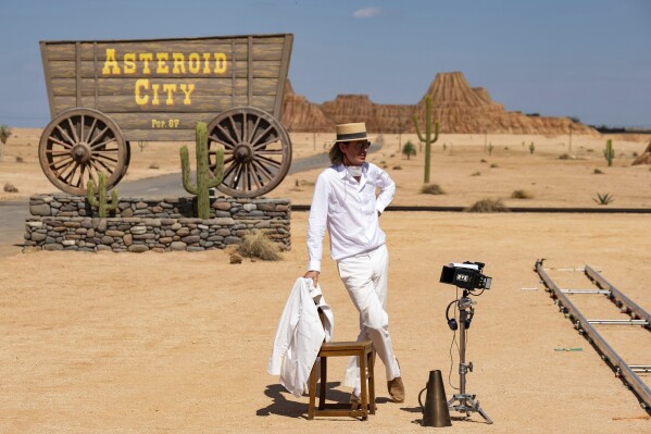 This image released by Focus Features shows writer/director Wes Anderson on the set of "Asteroid City." (Roger Do Minh/Focus Features via AP)