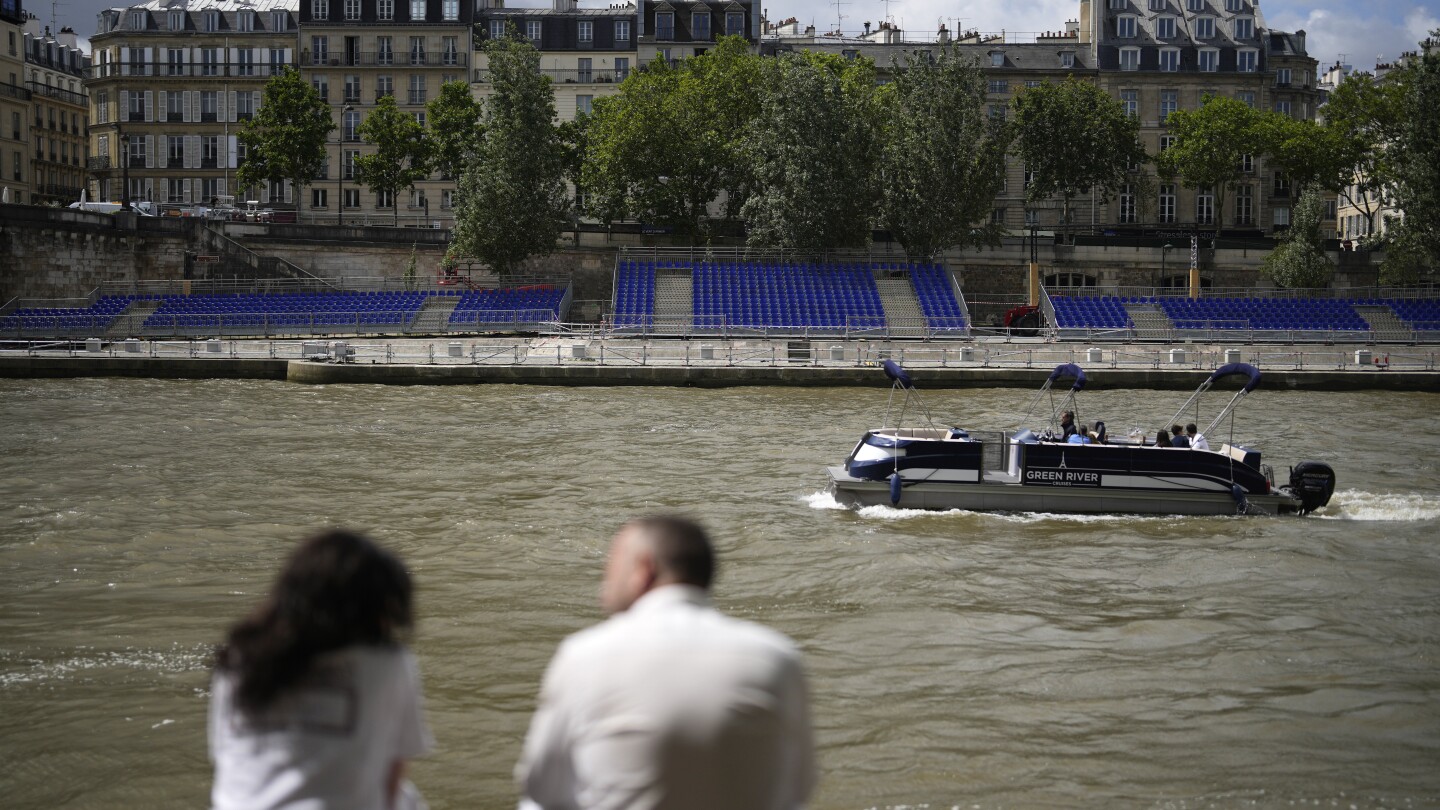 French Sports Minister Tests Seine's Olympic Readiness