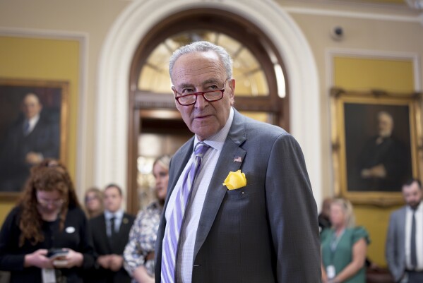 FILE - Senate Majority Leader Chuck Schumer, D-N.Y., pauses before talking with reporters after a meeting with fellow Democrats, at the Capitol in Washington, Tuesday, June 4, 2024. Senate Democrats are holding a vote to move forward with legislation designed to protect women’s access to contraception. The test vote on Wednesday comes as the Senate has abandoned hopes for doing serious bipartisan legislation before the election and as Senate Majority Leader Chuck Schumer and Democrats are trying to instead spotlight issues that they believe can help them win the presidency and keep the Senate in November. (AP Photo/J. Scott Applewhite, File)
