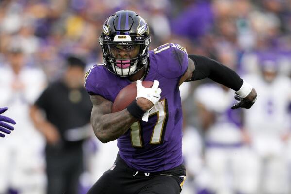 FILE - Baltimore Ravens running back Le'Veon Bell (17) runs during the second half of an NFL football game against the Minnesota Vikings, Sunday, Nov. 7, 2021, in Baltimore. The Tampa Bay Buccaneers have addressed the need for experienced depth at running back by signing former All-Pro Le’Veon Bell. Bell, released this season after appearing in five games with the Baltimore Ravens, joined the Bucs on Thursday, Dec. 22, as the reigning Super Bowl champions continue to deal with mounting injuries that have depleted a strong group of playmakers assembled around Tom Brady.(AP Photo/Nick Wass, File)