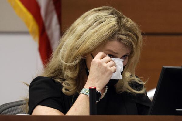 Patricia "Trish" Devaney Westerlind becomes emotional as she testifies during the penalty phase of the trial of Marjory Stoneman Douglas High School shooter Nikolas Cruz at the Broward County Courthouse in Fort Lauderdale, Fla., Tuesday, Aug. 23, 2022. Devaney Westerlind lived in Parkland from 1998 to 2008 and was a neighbor of the Cruz family. Cruz previously plead guilty to all 17 counts of premeditated murder and 17 counts of attempted murder in the 2018 shootings. (Amy Beth Bennett/South Florida Sun Sentinel via AP, Pool)