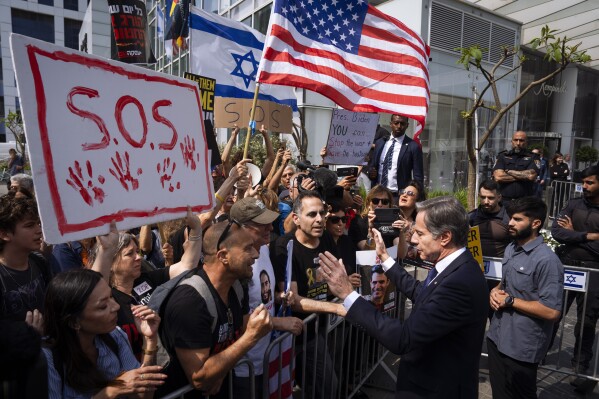 U.S. Secretary of State Antony Blinken speaks to families and supporters of Israeli hostages held by Hamas in Gaza during a protest calling for their return, after meeting families of hostages in Tel Aviv, Israel, Wednesday, May 1, 2024. (AP Photo/Oded Balilty)