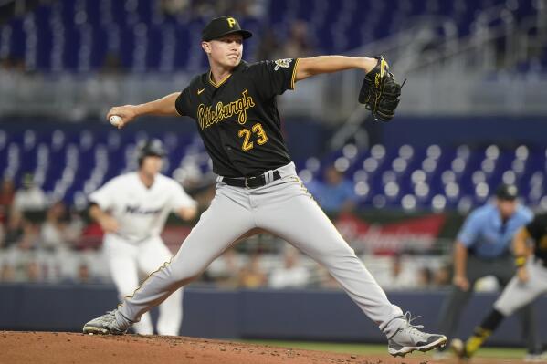 Pittsburgh Pirates starting pitcher Mitch Keller (23) aims a pitch during the first inning of a baseball game against the Miami Marlins, Monday, July 11, 2022, in Miami. (AP Photo/Marta Lavandier)