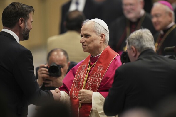 Pope Leo XIV meets Vice President JD Vance after the formal inauguration of his pontificate at St. Peter's Square on Sunday, May 18, 2025, on the Vatican (AP Photo/Alessandra Tarantino)